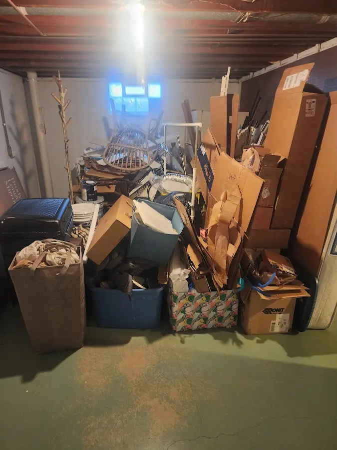 Roll-off dumpster container at job site for 2 Yard Dumpster Rental in Syracuse